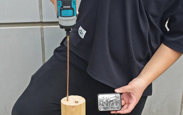 Test the electric screwdriver by driving long screws into wood to measure its torque output.